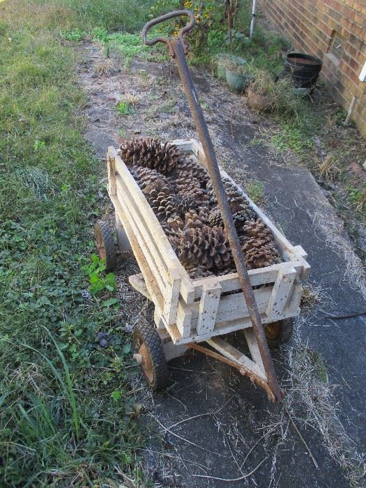 Vintage handcrafted wagon.  (Also, look for tons of large pine cones.)