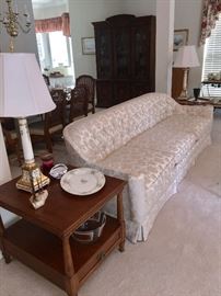 Henredon side table and cream sofa