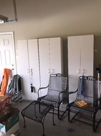 Storage cabinets and pair of wrought iron chairs with ottoman