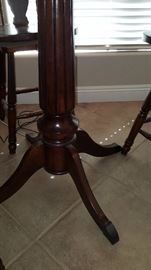 pub height table features a checkboard/chess top and comes with 4 stools