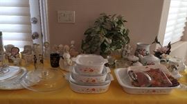 corning ware bakeware, collectible music boxes, pyrex retro mixing bowls and hummingbirds...lots of birds!