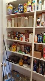 full pantry of unopened goods and storage containers