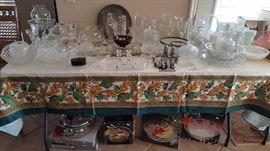 crystal, cut crystal, glass and milk glass - be sure to look under the tables too....lots to see, new in boxes! 