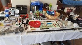 chachky table, electronics, thermos, games, binos, misc bric-a-brac