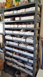 gads of household doodads, plumbing, electrical, tools, nails, etc - not pictured several metal and wood workbenches