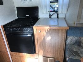 1998  Airstream  Bambi Camper- inside view of kitchenette.