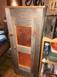 Fun decorative cabinet with copper detailing 