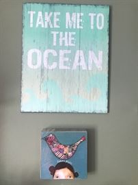 Take me to the ocean sign.