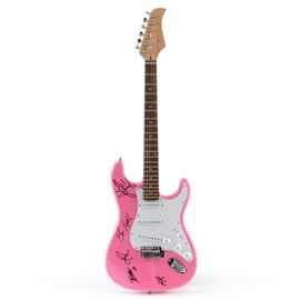 2016 Artists of Bosom Ball Signed Electric Guitar with COA: A pink Strat style electric guitar, signed by artists of the 2016 Bosom Ball event; Johnny Rzeznik, Ben Rector, Ruth B, Shawn Hook and Leon signed the pink color guitar’s body with a black marker. There is no manufacturer’s logo to the guitar. A gigbag style case, strings, strap, pics, allen wrench, clip-on tuner and instrument cable are included. Their signatures were obtained by Q102 at last years event; paperwork is included.