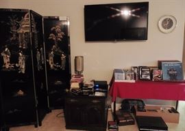 Chinese four-panel screen. Ethan Allen end table, CD'S, DVD's, LP's.TV Sold