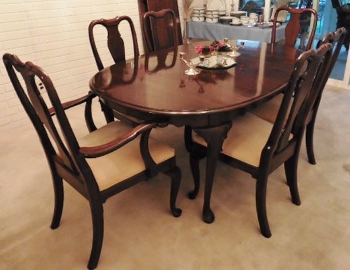 Ethan Allen "Georgian Court" dining table with 6 chairs; 2 leaves. One chair needs repair