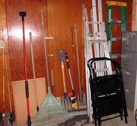 Ladders and garden and two fishing poles
