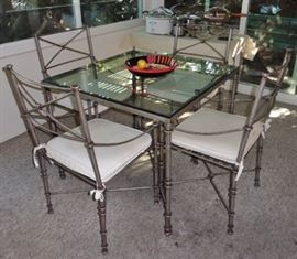 Glass top and iron casual dining table