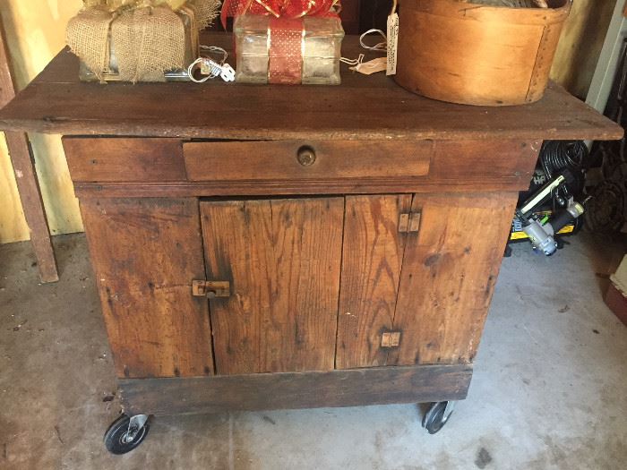 primitive small cabinet added wheels 