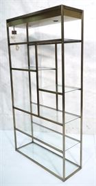 Lot 171 DESIGN INSTITUTE OF AMERICA Gold Tone Etagere. DI