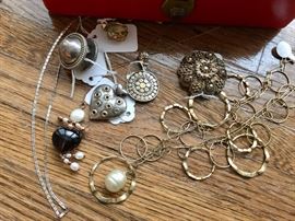 John Hardy pendant and other jewelry.