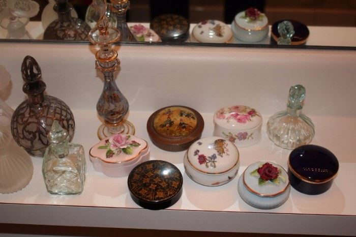 Assorted Perfume Bottles and Decorative Boxes
