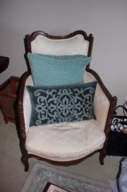 Upholstered Chair and Decorative Pillows