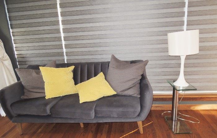 Living Room Sofa West Elm - 2 available.  Glass chrome C table.  Tulip lamps