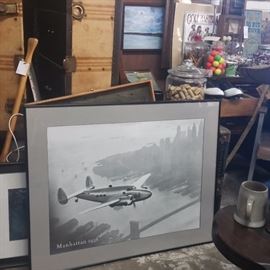 Manhatten 1938 
Lockheed L-14 Super Electra ... 
Lower Manhattan up to Chrysler and Empire State Buildings ... 
Just before Howad Hughs flew it around the world to set the speed record of the day ...