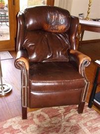 Two Leather recliners nail head trim(one is distressed)