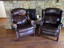 Two Leather recliners nail head trim(one is distressed)