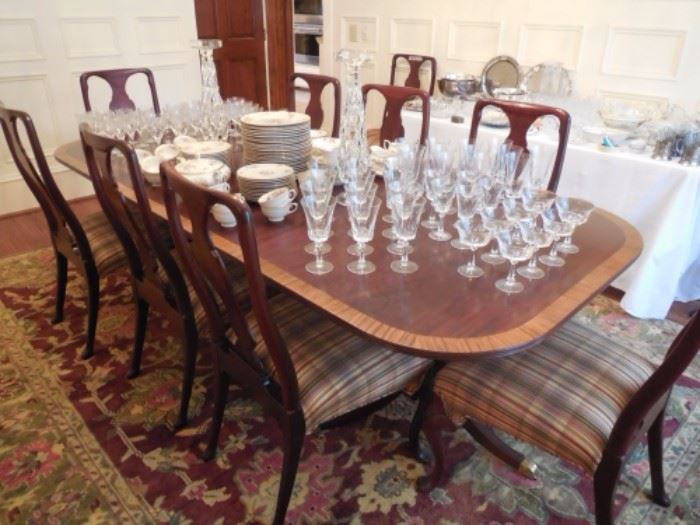 Dining table is sold! Set of 10 chairs is still available. 