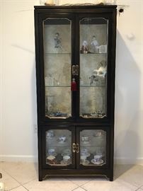 Only the curio cabinet is for sale. None of the contents are for sale.