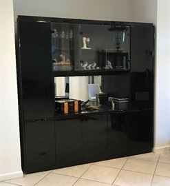 Black lacquer wall unit is for sale. Contents not for sale.