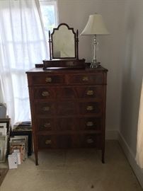 It's a marvelous chest in need of some TLC and a unique antique shaving stand.