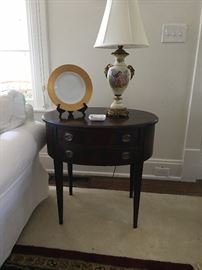 One of a  pair of tables and one of a pair of lamps.  