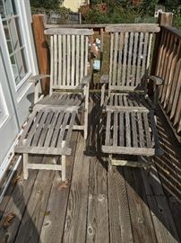 Ah... Last rays of summer--two teak wood chez longue.  They come with custom blue cushions.