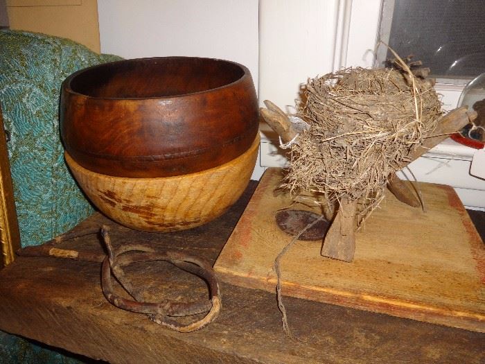 Turned wooden bowls; primitive twisted willow branch used for removing pots from fireplace.