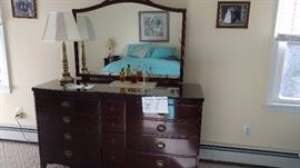 Solid wood mahogany dresser with mirror. 
