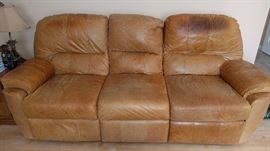 Leather wall hugger recliner.