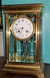 BAT:   French crystal regulator with elegantly cast brass case.  Back plate signed by the prestigious maker Japy.  Fired enamel dial, Breguet style hands, mercury vial pendulum.   Fine original condition, good running order.   Circa 1910.