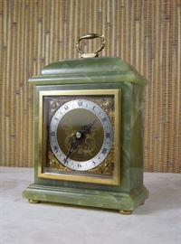 Elliott of London onyx and gilded brass bracket clock with 8-day platform escapement.  Beveled glass, gilded spandrels, engraved center dial.   An elegant example of the finest third quarter 20th century British clockmaking!  Running order.