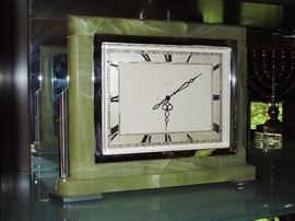 1930s English Art Deco executive mantle clock retailed by Harrods. Onyx and chromed brass case.
