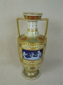 CW:   Important & Rare KPM Berlin porcelain cabinet vase with pate-sur-pate classical friezes & bust medallions; raised gilding on pastel shaded bands and dark crimson reserves.  7 1/4" high x 3 1/8" wide handle-to-handle.  Circa 1900.  Perfect condition!  