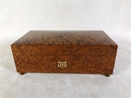 BAT:  Choice Reuge, Switzerland music box in thuya veneered hardwood case.  Three classical tunes on a 72-note comb.  1970s inventory from The Clocksmith of Glen Ellyn operated by Douglas and Barbara Tomsky.