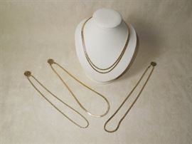 BAT:  selection of classic 14K gold necklaces including a double strand by Krementz