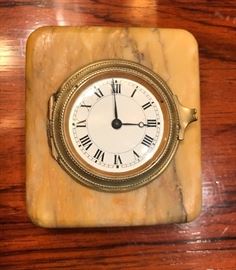 BAT:   French marble paperweight clock with elegant fired enamel dial, Breguet style hands, beaded bronze bezel and swing-out fully jeweled lever movement.  Circa 1900  Operating order