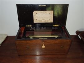 BAT:  Rare circa 1880s rosewood cased Swiss music box - plays eight light classical airs with hidden drum and castanet  accompaniment.   Fine operating order with original tune sheet