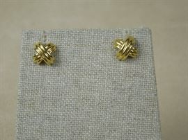 Pair Tiffany & Co. 18K gold earrings in classic design.