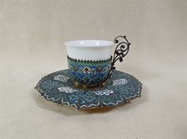 CW:   Turkish enameled and gilded silver demitasse cup with scroll filigree handle and porcelain insert.  Circa 1890. Fine condition.  
