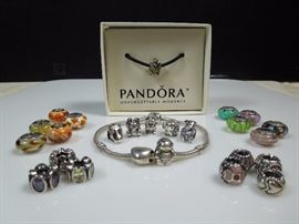 BAT:  Pandora sterling charms and bracelets.