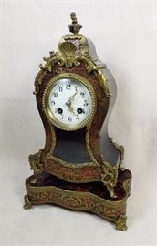 BAT:  Louis XV Revival gilt-bronze mounted Boulle tortoiseshell mantel clock with matching stand of unusually small proportions.  Cream enamel dial, pierced gilt-brass hands, 8-day movement striking hours and half-hours on a bell.  French, ca. 1890. 