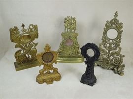 BAT:  Choice selection of late Victorian cast brass and iron pocket watch holders.