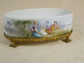 BAT:  Sevres style artist signed hand painted porcelain bowl with gilt-bronze frame and feet.  French, early 20th century.