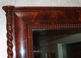 BAT:  Close-up illustrating carved stile caps, rich crotch mahogany veneers and ripple molding.